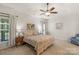 Main bedroom with ceiling fan and ample closet space at 2024 Holly Villa Cir, Indian Trail, NC 28079