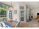 Kitchen with sunroom and view of the living room at 2024 Holly Villa Cir, Indian Trail, NC 28079