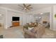 Bright living room with comfortable seating and a large TV at 2024 Holly Villa Cir, Indian Trail, NC 28079