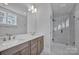 Modern bathroom with double vanity and frameless shower at 207 Davidson Gateway Dr, Davidson, NC 28036