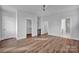 Main bedroom with hardwood floors and walk-in closet at 207 Davidson Gateway Dr, Davidson, NC 28036