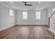 Spacious bonus room with hardwood floors and ceiling fan at 207 Davidson Gateway Dr, Davidson, NC 28036