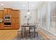 Charming breakfast nook with windows, a cozy table, and bench seating at 3015 Duclair Ln, Fort Mill, SC 29707