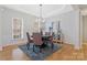 Elegant dining room with a round table, stylish chairs, and decorative lighting at 3015 Duclair Ln, Fort Mill, SC 29707