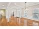 Bright dining room with hardwood floors and chandelier at 3015 Duclair Ln, Fort Mill, SC 29707