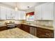 A close up view of the cabinets and stainless steel appliances in this renovated kitchen at 138 Huntly Ln, Mooresville, NC 28115