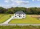 Aerial view of a beautiful home on a spacious lot with lush greenery at 2109 Goose Creek Farm Ln, Indian Trail, NC 28079