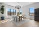 Bright dining room with a large wooden table and chandelier at 2109 Goose Creek Farm Ln, Indian Trail, NC 28079