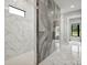 Spa-like shower with marble tile and double shower heads at 2109 Goose Creek Farm Ln, Indian Trail, NC 28079