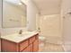 Clean bathroom with vanity, tub, and shower at 3308 Lemongrass Ln, Charlotte, NC 28214