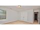 Bright bedroom with neutral walls, carpeting, and double-door closet at 3308 Lemongrass Ln, Charlotte, NC 28214