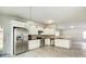 Modern kitchen with white cabinets and stainless steel appliances at 3308 Lemongrass Ln, Charlotte, NC 28214