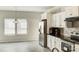 Modern kitchen with white cabinets and stainless steel appliances at 3308 Lemongrass Ln, Charlotte, NC 28214