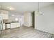 Modern kitchen with white cabinets and stainless steel appliances at 3308 Lemongrass Ln, Charlotte, NC 28214