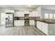 Modern kitchen with stainless steel appliances and granite countertops at 3308 Lemongrass Ln, Charlotte, NC 28214