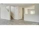 Bright living room with hardwood floors, and staircase at 3308 Lemongrass Ln, Charlotte, NC 28214