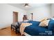 Bright bedroom with hardwood floors and two beds at 515 S Academy St, Lincolnton, NC 28092