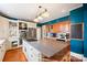 Kitchen boasts granite countertops, custom cabinetry, and stainless steel appliances at 515 S Academy St, Lincolnton, NC 28092