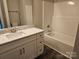 Elegant bathroom with a white vanity, granite countertop, and a shower-tub combination at 2054 Cane Mill Rd, Lancaster, SC 29720