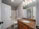 Bathroom featuring vanity with granite countertops, toilet, and bathtub with shower at 2840 Wheat Field Ct, Lincolnton, NC 28092