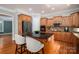 Elegant kitchen with a large island, custom cabinetry, and modern appliances, creating a functional and stylish space at 2840 Wheat Field Ct, Lincolnton, NC 28092