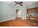 Spacious room with hardwood floors, built-in bookshelves and desk at 2840 Wheat Field Ct, Lincolnton, NC 28092