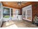 Enclosed porch featuring brick walls, a wood ceiling, and glass doors at 2840 Wheat Field Ct, Lincolnton, NC 28092