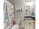 Charming bathroom with vanity, toilet, and a Parisian-themed shower curtain at 308 Montrose Dr, Waxhaw, NC 28173