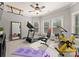 Dedicated home gym with treadmill, stationary bike, and floor mat at 308 Montrose Dr, Waxhaw, NC 28173