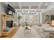 Bright living room with a stone fireplace and coffered ceiling at 308 Montrose Dr, Waxhaw, NC 28173