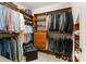 Spacious walk-in closet with custom shelving and hanging rods at 308 Montrose Dr, Waxhaw, NC 28173