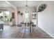 Bright dining room featuring a dark wood table, benches, and decorative accents at 7456 Hartsfield Dr, Lancaster, SC 29720