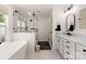 Spa-like bathroom showcasing a standalone tub and glass-enclosed shower with black fixtures at 1046 Sutton Spring Rd, York, SC 29745