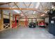 Spacious garage with epoxy floors, car lift, and room for multiple vehicles at 1046 Sutton Spring Rd, York, SC 29745