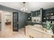 Sophisticated home office with built-in shelving, modern light fixture, and sleek desk at 1046 Sutton Spring Rd, York, SC 29745