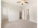 Spacious bedroom featuring carpet floors, plenty of closet space, and ample natural light at 429 Nathaniel Way # Brx0032, Charlotte, NC 28213