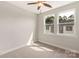 Bright bedroom featuring neutral carpet and natural light from two windows at 429 Nathaniel Way # Brx0032, Charlotte, NC 28213