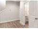 Bonus room features laminate floors and a powder room at 429 Nathaniel Way # Brx0032, Charlotte, NC 28213