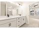 Bathroom featuring double vanity, walk-in shower with black trim, and tile flooring at 441 Nathaniel Way # Brx0035, Charlotte, NC 28213