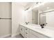 Bright bathroom featuring a double sink vanity with matte black fixtures and large framed mirror at 441 Nathaniel Way # Brx0035, Charlotte, NC 28213