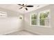 Neutral bedroom with tree views from several windows, neutral carpet, and a ceiling fan at 441 Nathaniel Way # Brx0035, Charlotte, NC 28213