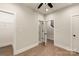 Bright bedroom featuring wood-look flooring, neutral walls, and a ceiling fan for added comfort at 441 Nathaniel Way # Brx0035, Charlotte, NC 28213