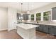 Well-lit kitchen with stylish pendant lights and a spacious island at 441 Nathaniel Way # Brx0035, Charlotte, NC 28213