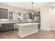 Modern kitchen with stainless steel appliances and white countertops at 441 Nathaniel Way # Brx0035, Charlotte, NC 28213