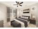 Main bedroom showing stylish furnishings and abundant natural light from multiple windows at 441 Nathaniel Way # Brx0035, Charlotte, NC 28213