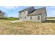 Backyard with a concrete patio and grassy area at 4122 Old Monroe Marshville Rd, Wingate, NC 28174