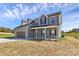Exterior view of home includes a two-car garage and covered porch at 4122 Old Monroe Marshville Rd, Wingate, NC 28174