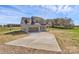 Exterior view of home with a concrete driveway and front yard at 4122 Old Monroe Marshville Rd, Wingate, NC 28174