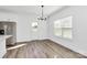 Bright kitchen with stainless steel appliances, granite countertops, and modern lighting at 4122 Old Monroe Marshville Rd, Wingate, NC 28174