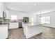 Modern kitchen featuring stainless steel appliances, granite countertops and white cabinets at 4122 Old Monroe Marshville Rd, Wingate, NC 28174